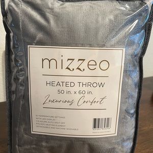 HEATED THROW…50 in X 60 in. Never used..